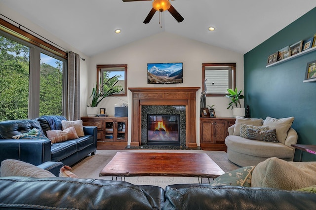 944 Cove Ct NW, Sauk Rapids, MN 56379 - living area with ceiling fan, vaulted ceiling, a fireplace, wood finished floors, and plenty of natural light