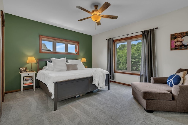 944 Cove Ct NW, Sauk Rapids, MN 56379 - bedroom with multiple windows, carpet flooring, baseboards, and ceiling fan