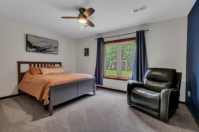 944 Cove Ct NW, Sauk Rapids, MN 56379 - bedroom featuring carpet, baseboards, and a ceiling fan