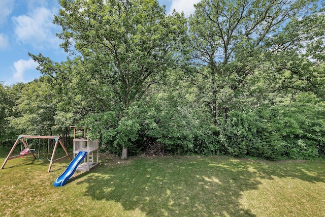 944 Cove Ct NW, Sauk Rapids, MN 56379 - view of green lawn featuring a playground