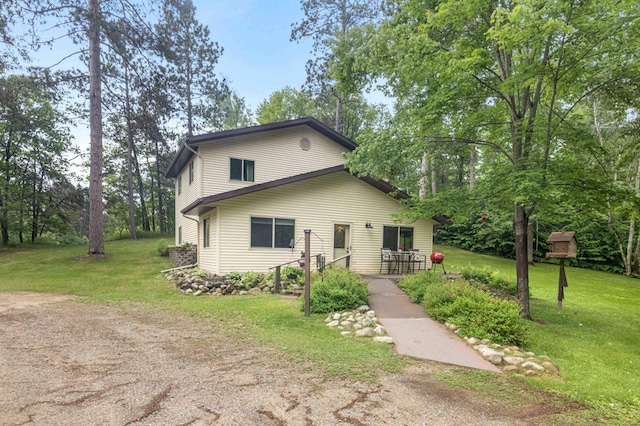 32157 County Road 39, Breezy Point, MN 56472 - view of front facade featuring a front lawn