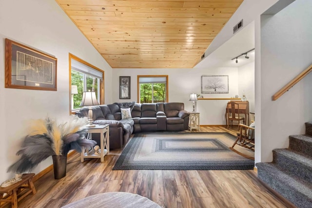 32157 County Road 39, Breezy Point, MN 56472 - living area with stairs, track lighting, wood finished floors, vaulted ceiling, and wood ceiling