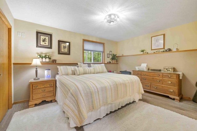 32157 County Road 39, Breezy Point, MN 56472 - bedroom with light wood-type flooring and baseboards