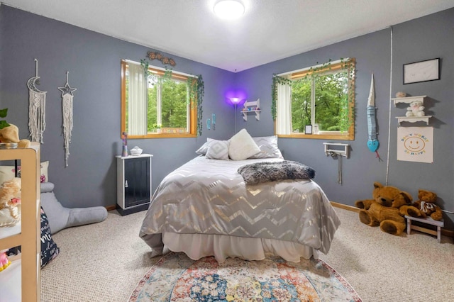 32157 County Road 39, Breezy Point, MN 56472 - carpeted bedroom featuring multiple windows
