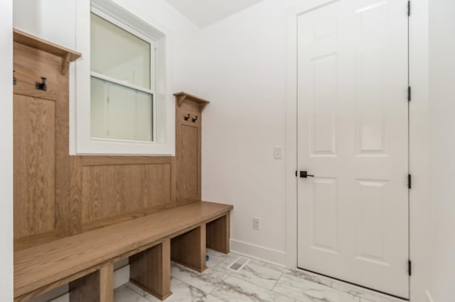 19908 67th Ave, Corcoran, MN 55340 - mudroom with light marble finish floors and baseboards