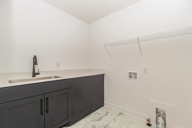 19908 67th Ave, Corcoran, MN 55340 - laundry room with hookup for a washing machine, light marble finish floors, baseboards, and cabinet space