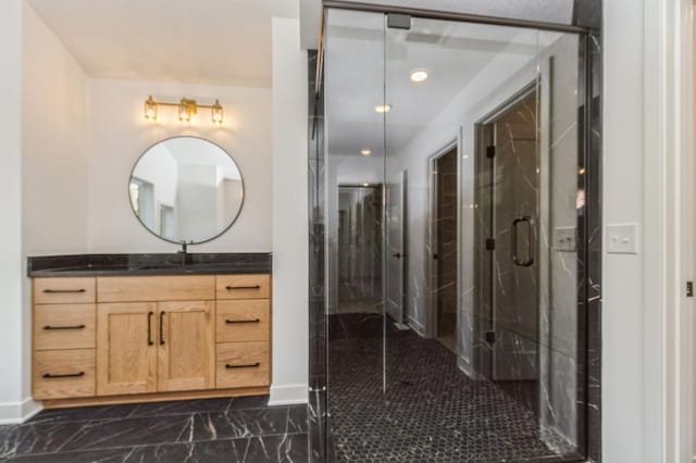 19908 67th Ave, Corcoran, MN 55340 - full bath featuring marble finish flooring, vanity, a shower stall, baseboards, and elevator