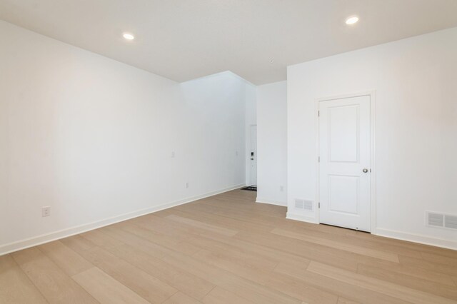 10485 Harbor Ln N, Maple Grove, MN 55369 - unfurnished room with light wood-type flooring, recessed lighting, and baseboards