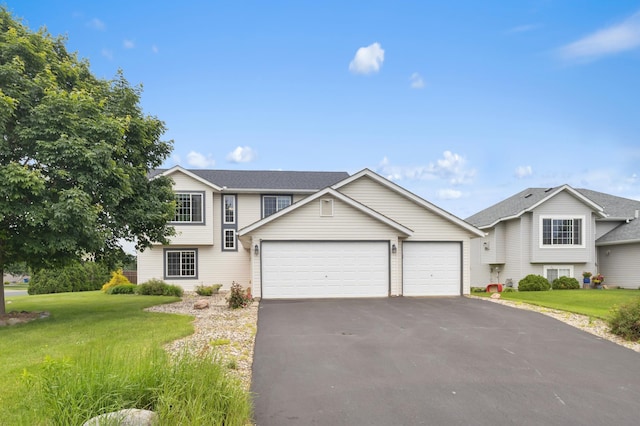 2909 Molina St, Shakopee, MN 55379 - view of front facade with driveway, a garage, a front lawn, and roof with shingles