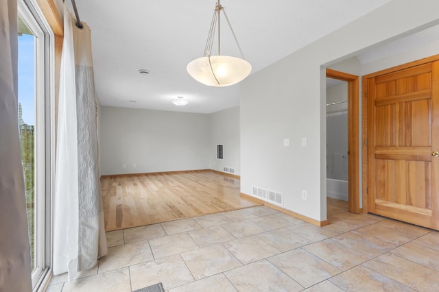2909 Molina St, Shakopee, MN 55379 - spare room featuring baseboards