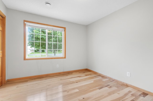 2909 Molina St, Shakopee, MN 55379 - unfurnished bedroom featuring light wood-style floors and baseboards