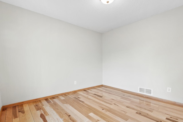 2909 Molina St, Shakopee, MN 55379 - unfurnished room with hardwood / wood-style floors and baseboards