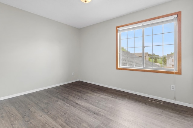 2909 Molina St, Shakopee, MN 55379 - unfurnished room featuring baseboards and wood finished floors