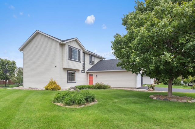 2909 Molina St, Shakopee, MN 55379 - view of side of home featuring a lawn and an attached garage