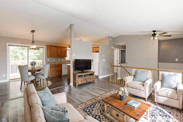 715 49th St S, Fargo, ND 58103 - living area featuring vaulted ceiling, a ceiling fan, wood finished floors, and baseboards