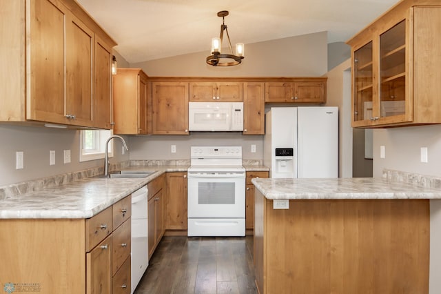 715 49th St S, Fargo, ND 58103 - kitchen featuring white appliances, a sink, lofted ceiling, a peninsula, and dark wood-type flooring