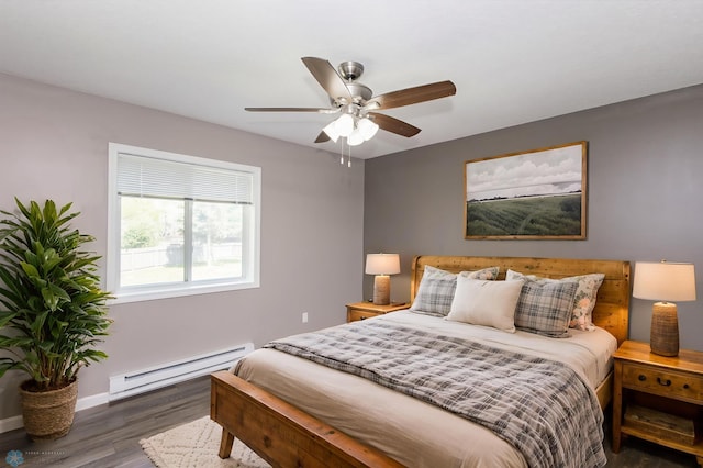 715 49th St S, Fargo, ND 58103 - bedroom featuring a baseboard radiator, wood finished floors, baseboards, and a ceiling fan