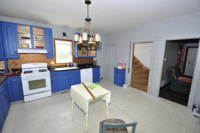 69198 235th St, Dexter, MN 55926 - kitchen featuring white appliances, blue cabinetry, and light floors