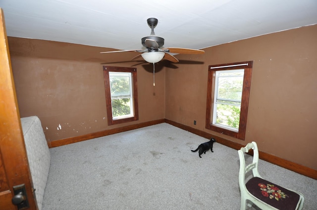 69198 235th St, Dexter, MN 55926 - carpeted empty room featuring baseboards and a ceiling fan