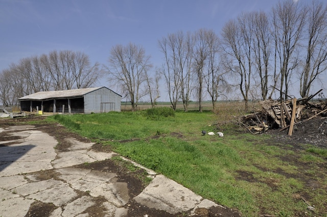 69198 235th St, Dexter, MN 55926 - view of yard with a pole building and an outdoor structure
