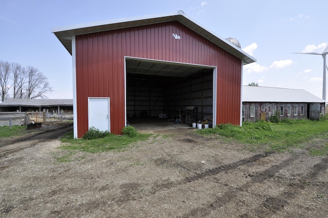 69198 235th St, Dexter, MN 55926 - view of pole building featuring dirt driveway