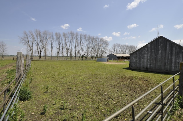69198 235th St, Dexter, MN 55926 - view of yard with an outdoor structure and a rural view