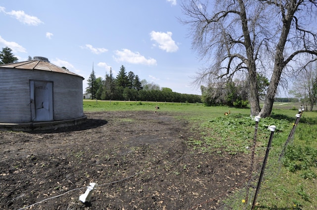 69198 235th St, Dexter, MN 55926 - view of yard featuring a shed