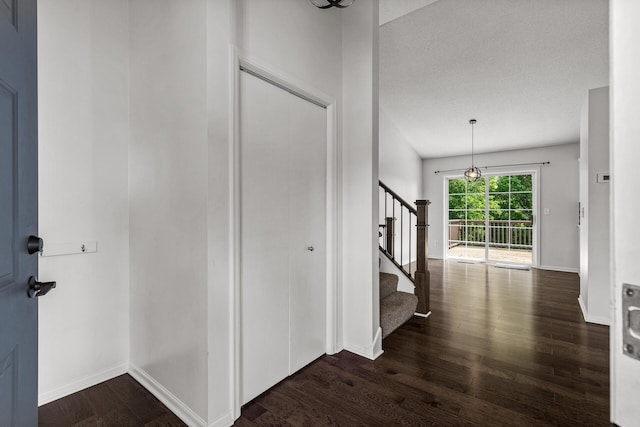 6956 Delarosa Ct, Inver Grove Heights, MN 55076 - entrance foyer featuring dark wood-style floors and stairway