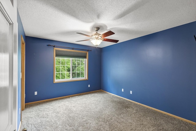 6956 Delarosa Ct, Inver Grove Heights, MN 55076 - unfurnished room featuring carpet flooring, a ceiling fan, and a textured ceiling