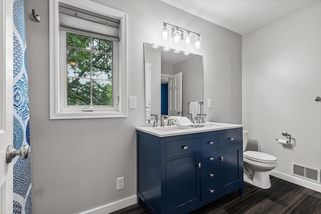 6956 Delarosa Ct, Inver Grove Heights, MN 55076 - full bath with wood finished floors and double vanity