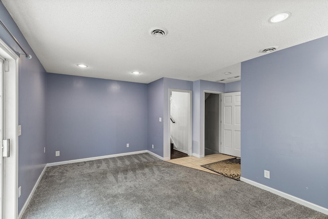 6956 Delarosa Ct, Inver Grove Heights, MN 55076 - unfurnished bedroom featuring carpet, a textured ceiling, and recessed lighting