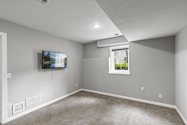 6956 Delarosa Ct, Inver Grove Heights, MN 55076 - below grade area with a textured ceiling, carpet flooring, and recessed lighting