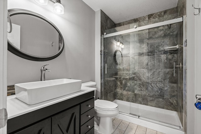 6956 Delarosa Ct, Inver Grove Heights, MN 55076 - full bath featuring vanity, a shower stall, and tile patterned flooring