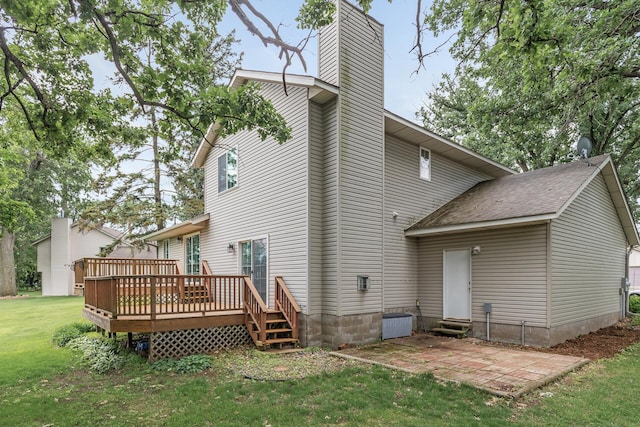 6956 Delarosa Ct, Inver Grove Heights, MN 55076 - back of property with a chimney, a yard, a deck, a patio area, and entry steps