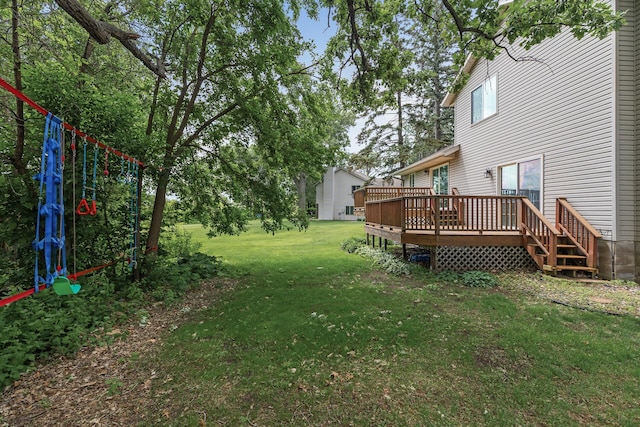 6956 Delarosa Ct, Inver Grove Heights, MN 55076 - view of green lawn with a wooden deck