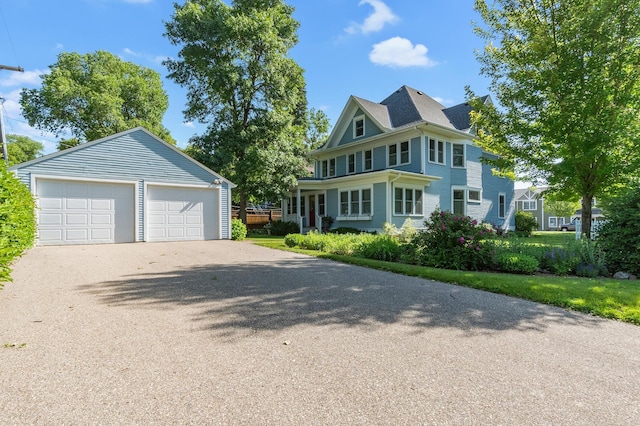 922 Fillmore St, Alexandria, MN 56308 - view of front of home featuring an outbuilding and a detached garage