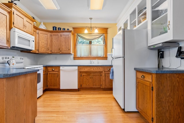 922 Fillmore St, Alexandria, MN 56308 - kitchen featuring white appliances, light wood-style flooring, brown cabinets, decorative light fixtures, and crown molding