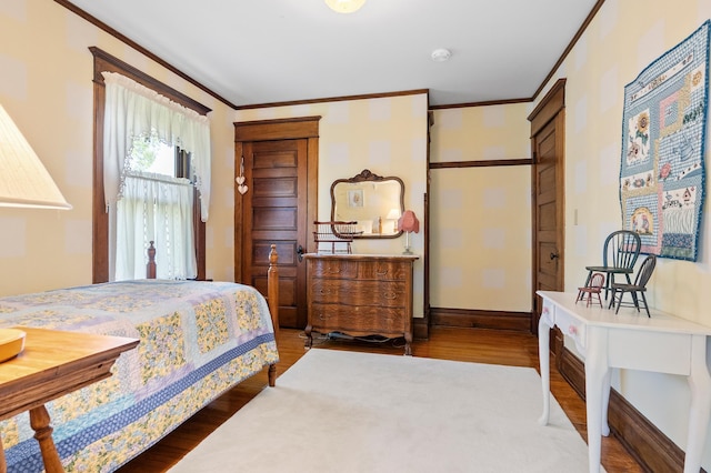 922 Fillmore St, Alexandria, MN 56308 - bedroom with crown molding and wood finished floors