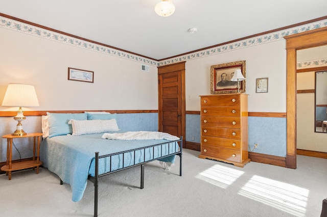 922 Fillmore St, Alexandria, MN 56308 - carpeted bedroom with wainscoting