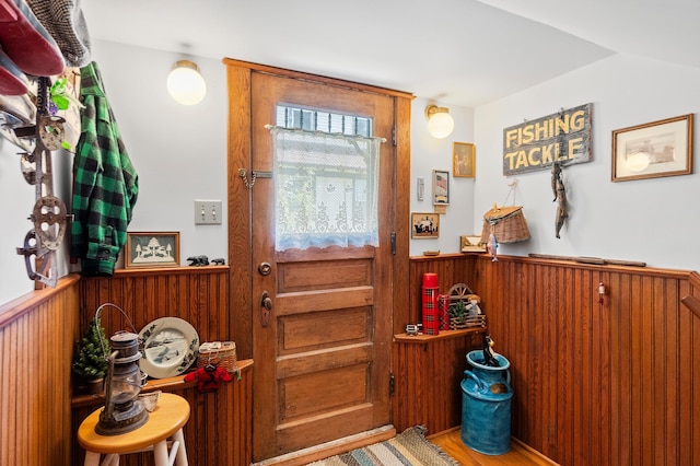 922 Fillmore St, Alexandria, MN 56308 - doorway featuring a wainscoted wall and wooden walls