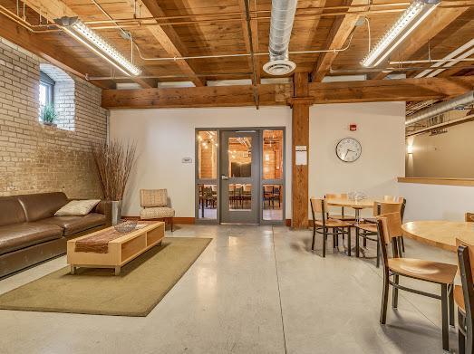 127 5th St NE Unit G08, Minneapolis, MN 55413 - lobby featuring brick wall