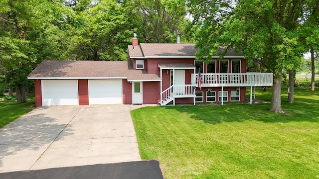 4195 25th St NE, Sauk Rapids, MN 56379 - view of front of property with a front yard, an attached garage, concrete driveway, roof with shingles, and a chimney