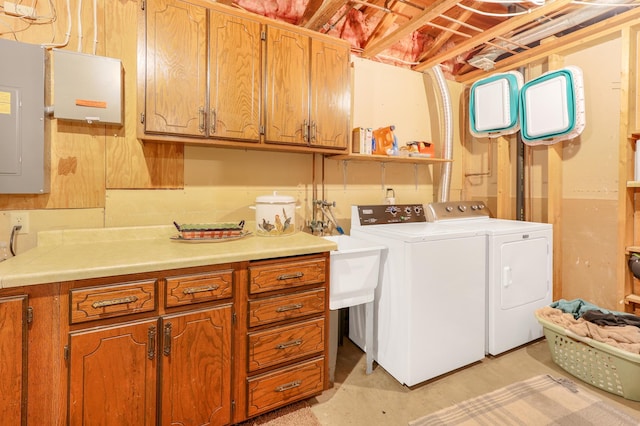 4195 25th St NE, Sauk Rapids, MN 56379 - laundry area featuring independent washer and dryer and cabinet space