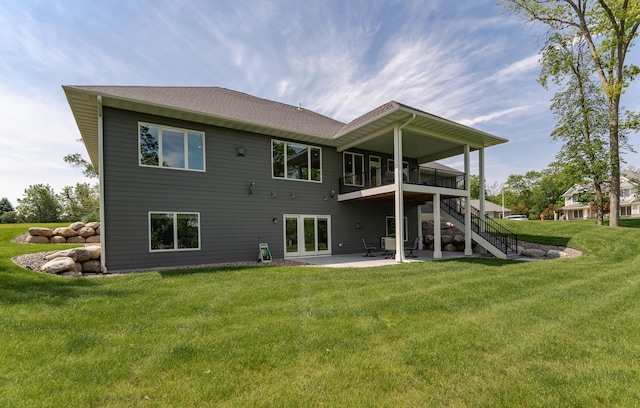 3039 Lady Slipper Ln SW, Rochester, MN 55902 - back of house with a patio, stairway, a lawn, and roof with shingles