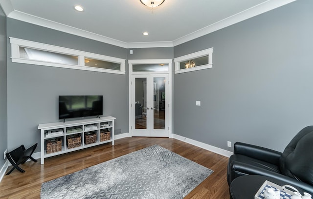 3039 Lady Slipper Ln SW, Rochester, MN 55902 - living area with french doors, recessed lighting, crown molding, and wood finished floors