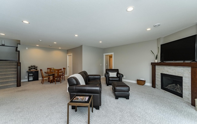 3039 Lady Slipper Ln SW, Rochester, MN 55902 - living area featuring stairway, carpet floors, recessed lighting, and a glass covered fireplace