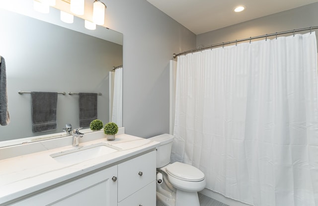 3039 Lady Slipper Ln SW, Rochester, MN 55902 - bathroom with vanity and recessed lighting