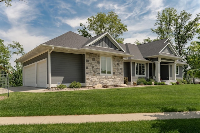 3039 Lady Slipper Ln SW, Rochester, MN 55902 - craftsman house with stone siding, board and batten siding, a front lawn, an attached garage, and driveway