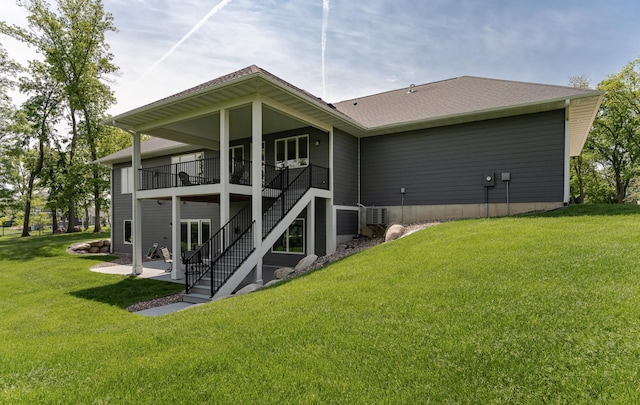 3039 Lady Slipper Ln SW, Rochester, MN 55902 - rear view of property with stairs, a patio, and a yard