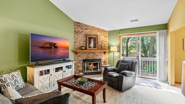 2606 Lake Court Dr, Mounds View, MN 55112 - living room featuring a brick fireplace, carpet flooring, vaulted ceiling, and a textured ceiling